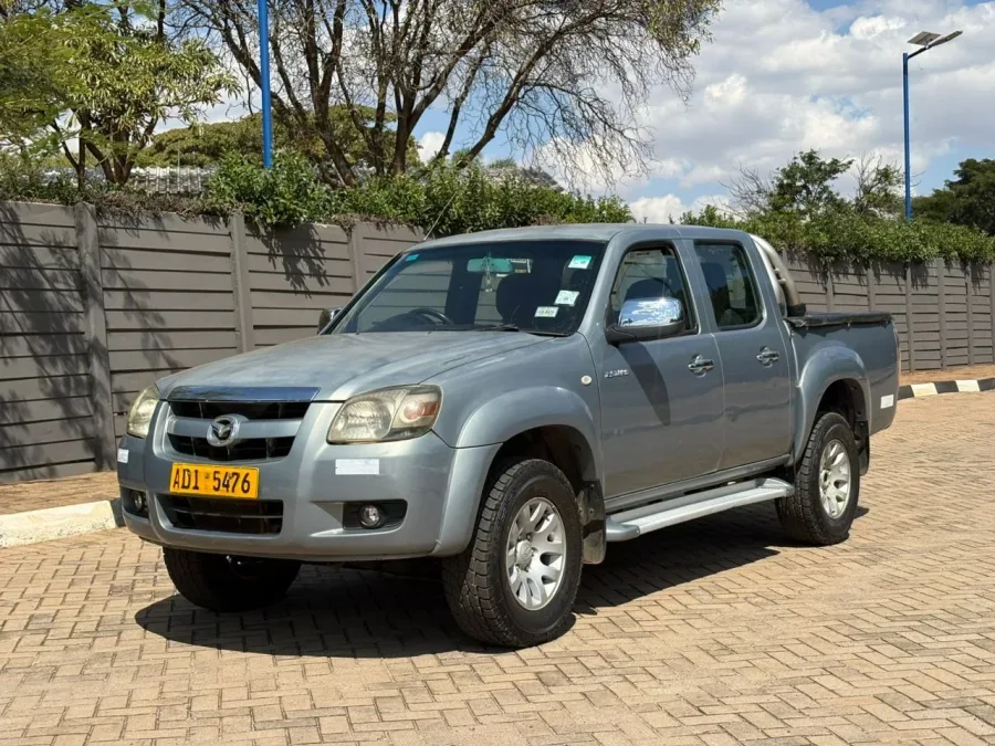 Mazda BT-50 Double Cab, 2009 Model, Mileage @ 183.000km,2.5L Turbo Diesel Engine, Manual 4x2, Fabric Interior, Alloy Wheels, Anti-roll Bar