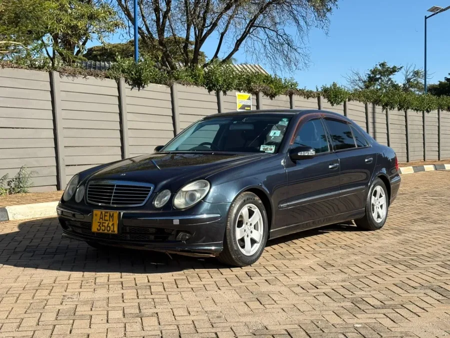 Mercedes-Benz E320, 2004 Model, Petrol Engine, Automatic Transmission, Leather Interior, Parking Sensors, Alloy Wheels, Blue Colour