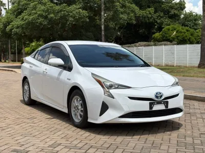 Toyota Prius Hybrid, 2017 Model, Mileage @ 55,000km, 1.8L Petrol Engine, Automatic, Reverse Camera, Traction Control, White Colour