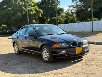 BMW 320i E46, 2000 Model, Mileage @ 120,000km, Petrol Engine, Automatic Transmission, Petrol Engine, Neat Fabric Interior, Alloy Wheels, Blue Colour 