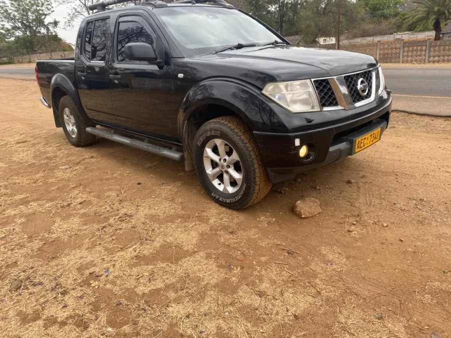 Nissan Navara Double Cab, 2007 Model, YD25 Diesel Engine, Manual 4x4, Alloy Wheels, Black Colour