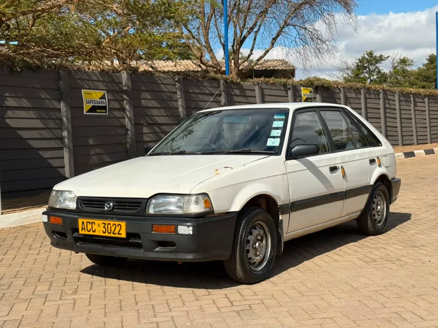 Mazda 323 Hatchback, 1998 Model, Mileage @ 146,000km, Petrol Engine, Manual, Willowvale Motor Indust