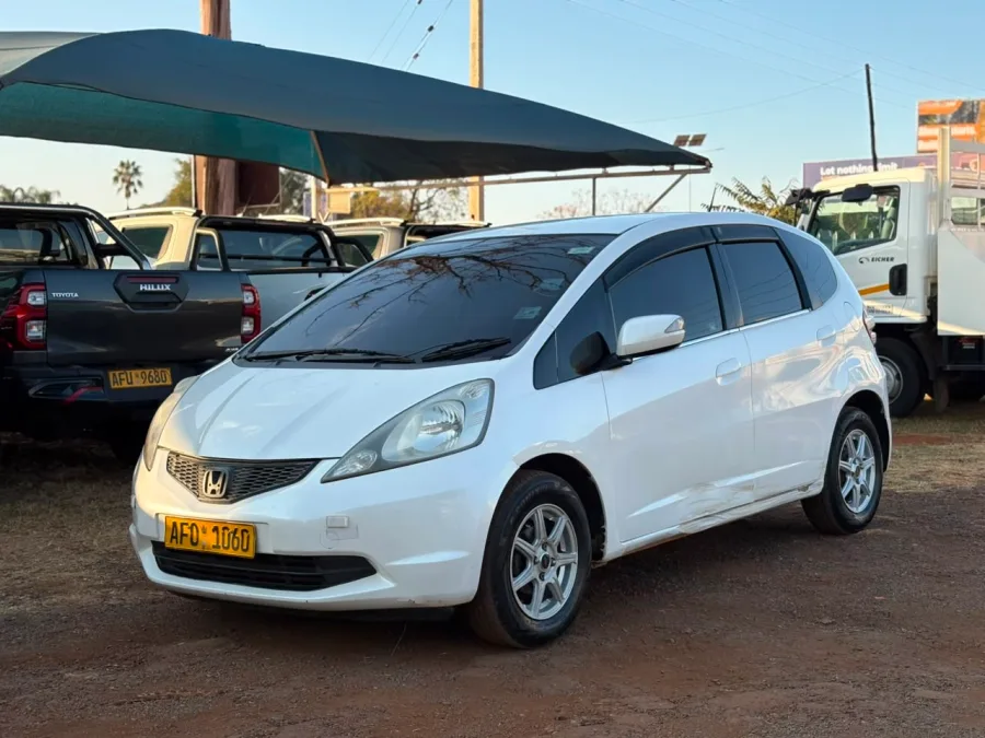 Honda Fit GE6, 2007 Model, 1.3L Petrol Engine, Automatic, Fabric Interior, White Colour