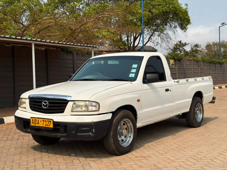 Mazda B1800, 2006 Model, Manual Transmission, F8 Petrol Engine, Fabric Interior, White Colour