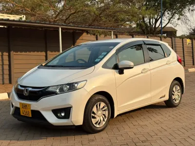Honda Fit GK3 Non-Hybrid, 2017 Model, Mileage @ 87,000km, Petrol Engine, Auto, Half-Leather Interior