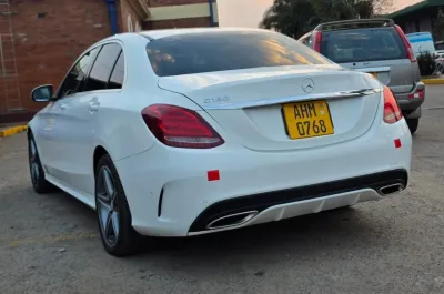 2017 Mercedes-Benz C180 AMG Line Sedan – White, 69,000 km
