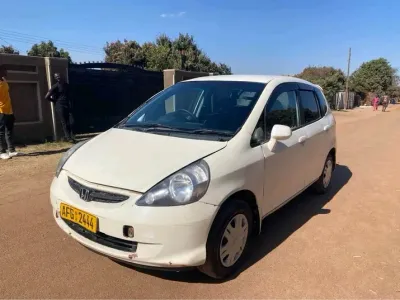 2004 Honda Fit, 143,000 km, reliable daily runner