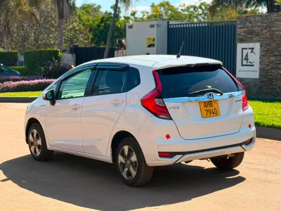 2019 Honda Fit Hybrid – White, 196,000 km