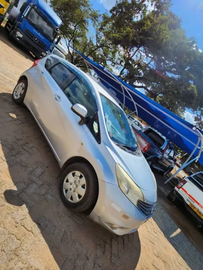 2018 Nissan Note, 142,812 km, white hatchback, Harare