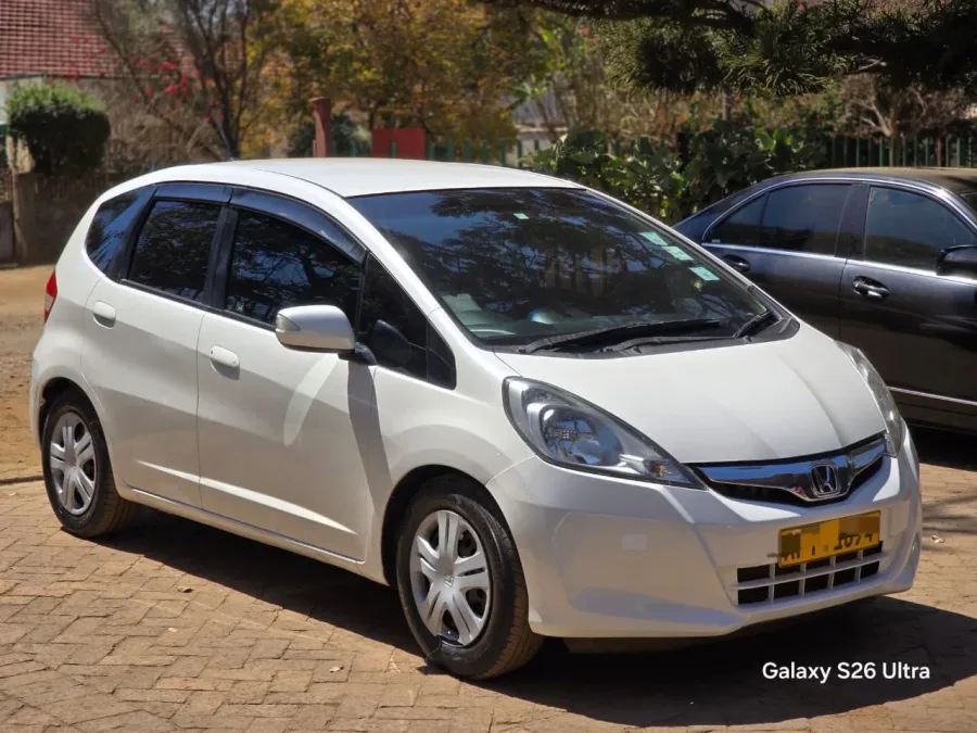 Honda Fit 2012 in white, 41,280 km, Harare