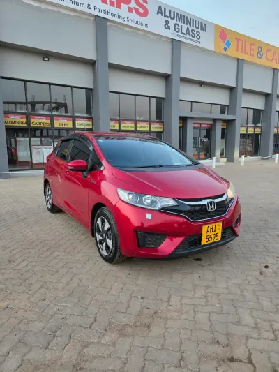 Honda Fit Hybrid 2019 Red Hatchback - Kwekwe