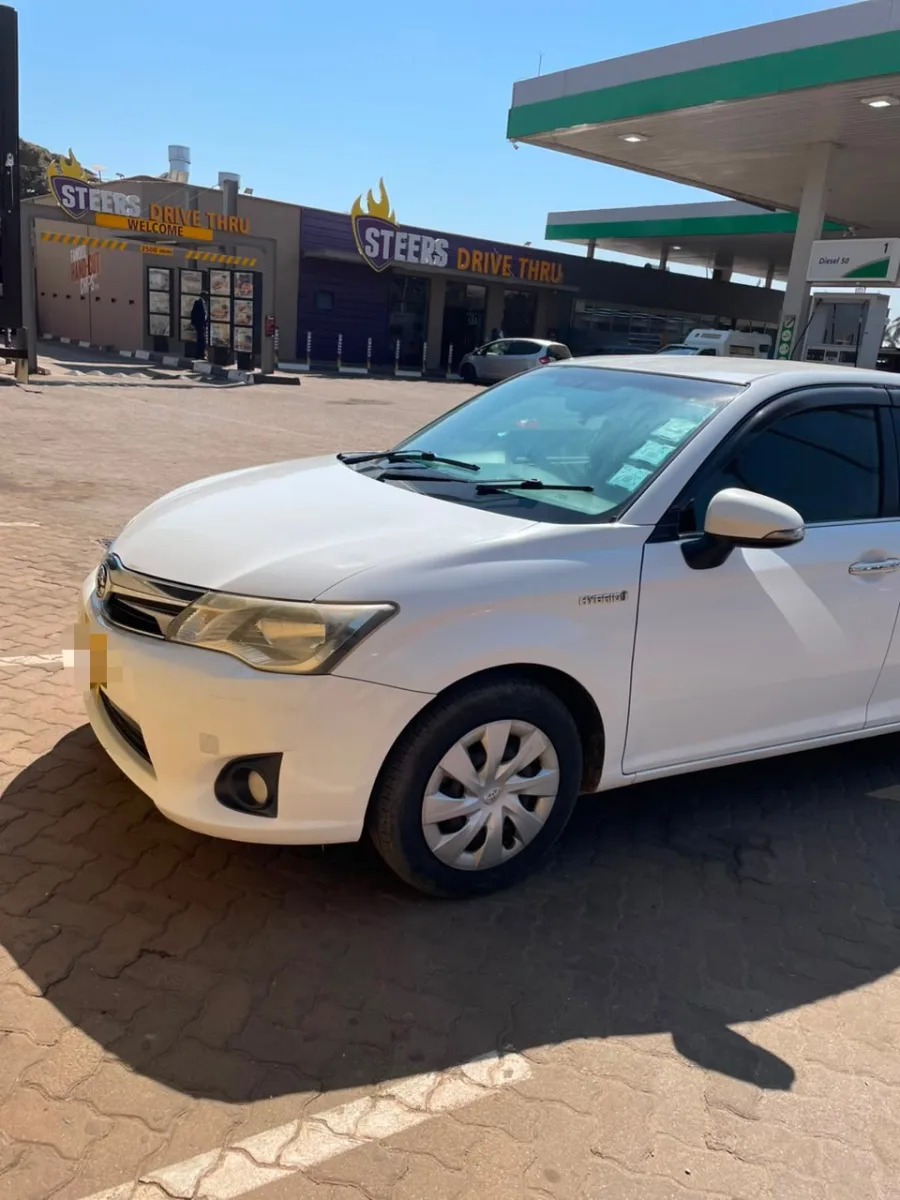 Toyota Corolla Axio Hybrid 2014, 120 000 km, excellent condition