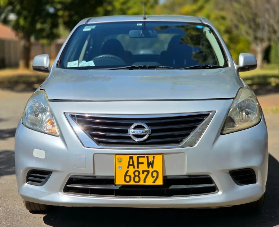 Nissan Latio 2013 with 120,000 km — automatic sedan