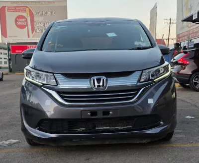Honda Freed Hybrid 1.5L 5-seater with cruise control and rear camera
