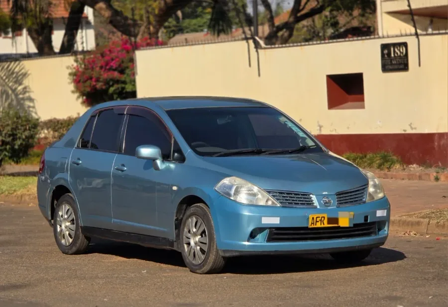 Nissan Tiida 2004, 180,000 km, well-maintained sedan