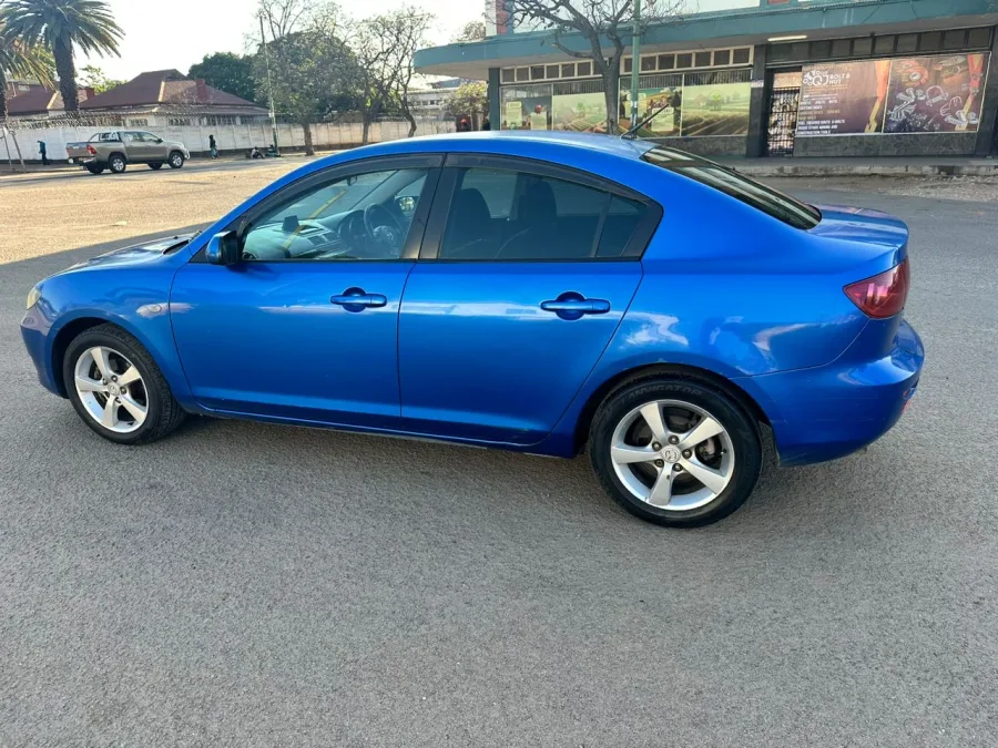2004 Mazda 3 Sedan, 240,000 km
